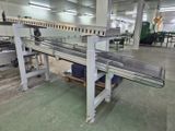 a conveyor belt in the middle of a factory
