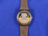une montre sur laquelle est représenté un clown