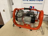 a small pump that is sitting on a table