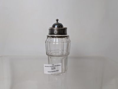 a salt shaker sitting on a table with a price tag