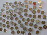 a lot of coins that are on the table