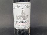 a bottle of wine that is sitting on a table