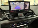 a picture of a car dashboard with a tv in it