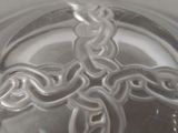 an image of a glass of water with a cross on it
