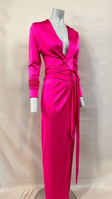 a mannequin dress with long sleeves and a wrap around the waist