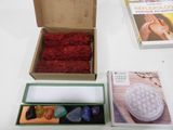 a box of stones and a book on a table