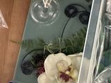 a plastic container filled with assorted items on a table