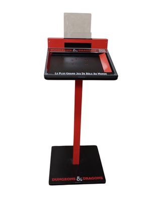 a red and black display stand with a piece of paper on it