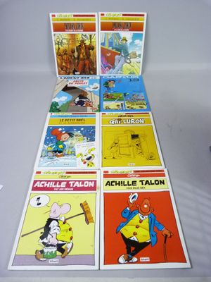 beaucoup de bandes dessinées sur la table