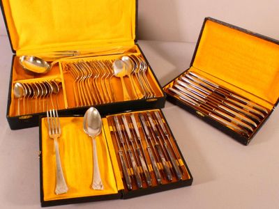 a case with silverware in it on a table