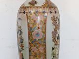 a vase that is sitting on a white table