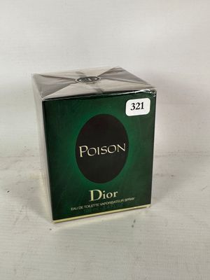 a box of dior perfume sitting on a white surface