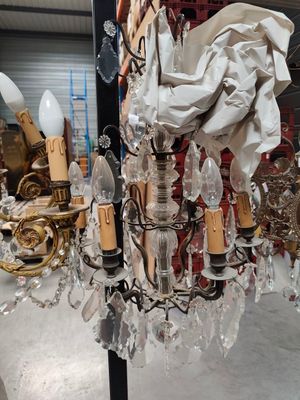 a chandelier that has a lot of glass hanging from it