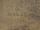an image of a close up of a piece of wood with writing on it
