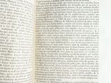 an open book with a black and white picture on it