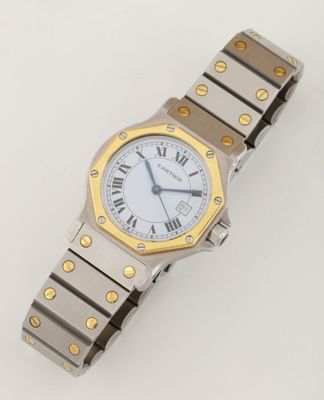 cartier an 18ct gold and stainless automatic calendar wristwatch
