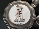 a plate that has a picture of a man on it