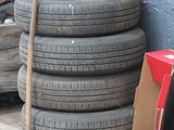 a pile of tires and a box on the ground