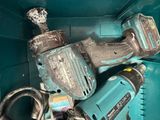 two electric tools that are sitting in a blue box