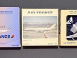 three boxes of air france cigarettes sitting on a table