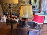 a lamp that is sitting on a table in a room