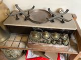 an old stove with a lot of pots and pans on it