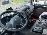 a car dashboard with a steering wheel and a dash board