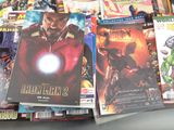 a lot of comic books on the table