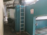 a ladder that is leaning against a wall in a room