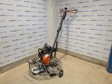 a machine that is sitting on the floor in a room