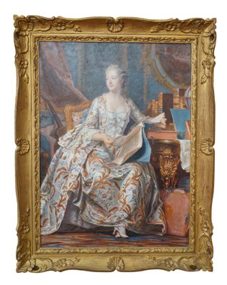 tableau représentant une femme en train de lire un livre, dans un cadre doré richement décoré