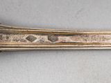 a close up of a spoon on a table
