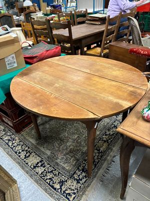 a table that has a lot of chairs around it