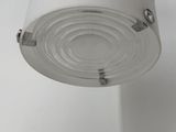 a close up of a lamp hanging from a ceiling
