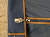 a piece of luggage that has a zipper on it