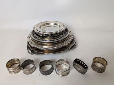 a stack of silver rings sitting on top of each other
