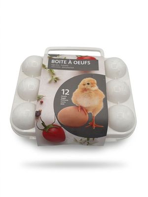 une boîte d'œufs dans laquelle se trouve une poule