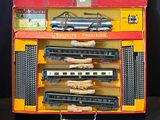 a toy train that is in a box on a table