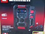 an image of a box with a radio in it sitting on the ground