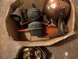 a box full of old items sitting on the floor