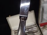 a knife that is sitting on top of a box