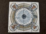 une photo d'un morceau de tissu orné d'un motif