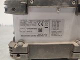 a close up of a metal box with a label on it
