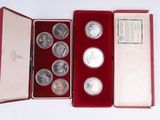 un étui rouge contenant six pièces d'argent