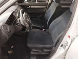 a picture of the interior of a car with a steering wheel
