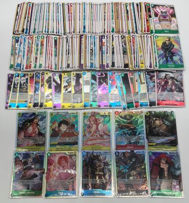 a large collection of card game cards sitting on top of a table