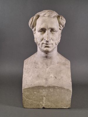 marble bust of a man with a beard and a moustache
