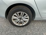 a close up of a car tire on the road