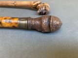 two canes that are sitting on a table