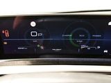 a close up of a car dashboard with a digital display